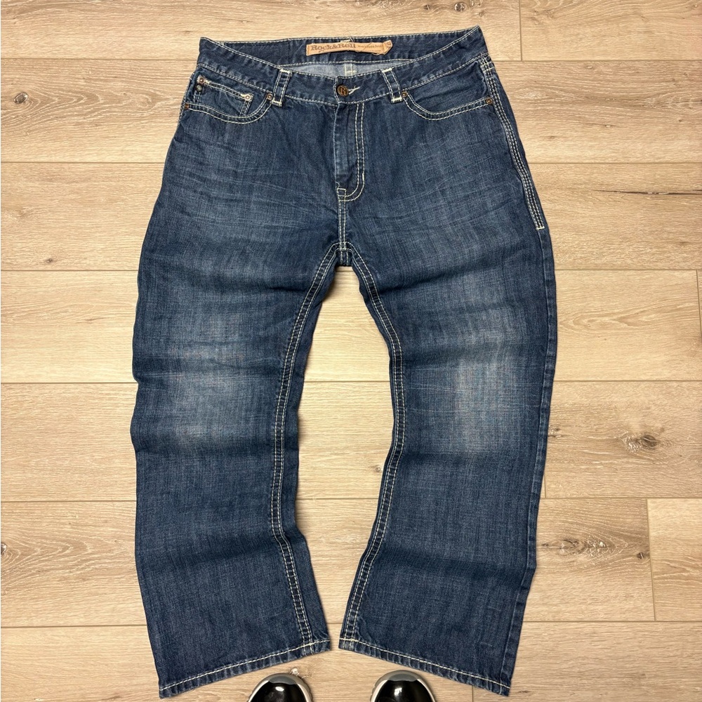 Rock and roll cowboy men’s double barrel relaxed bootcut jeans.